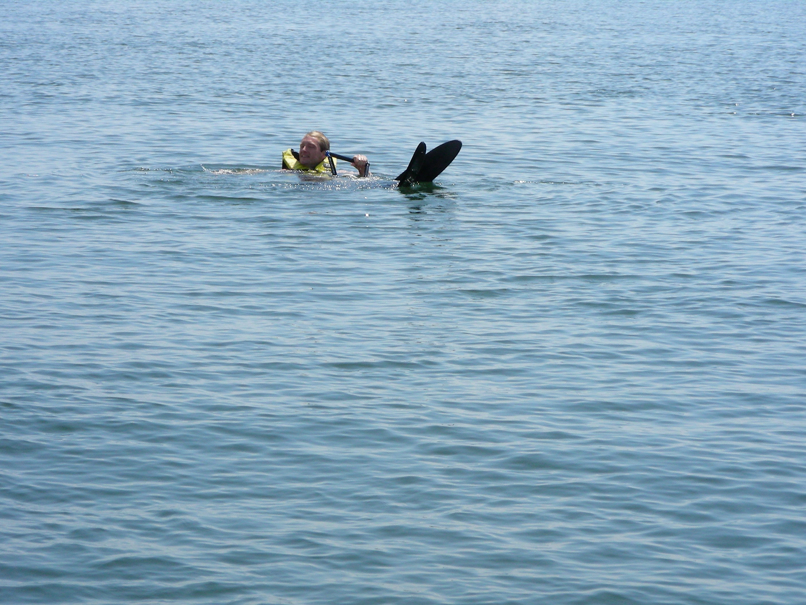 ./2010/Kerr Lake/Luis boating w guys 0021.JPG